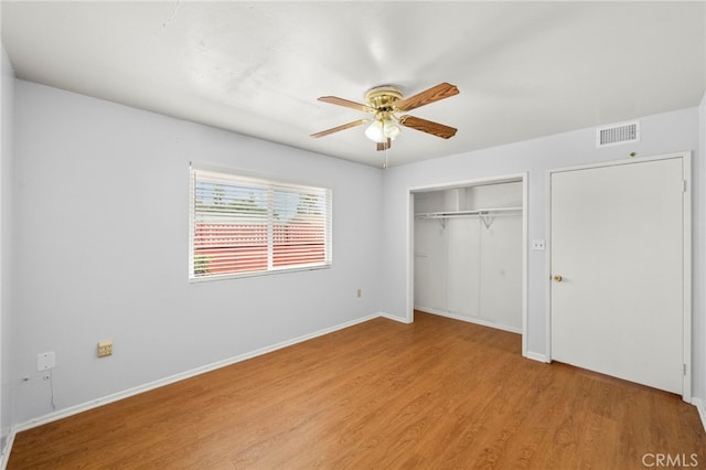 25925 Roanoke Rd, Menifee, CA 92586 - unfurnished bedroom featuring light wood-style flooring, a closet, and ceiling fan