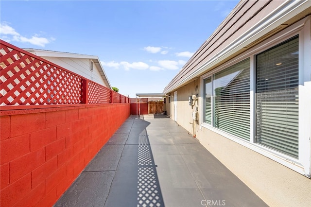 25925 Roanoke Rd, Menifee, CA 92586 - view of home's exterior featuring a fenced backyard, stucco siding, and a patio