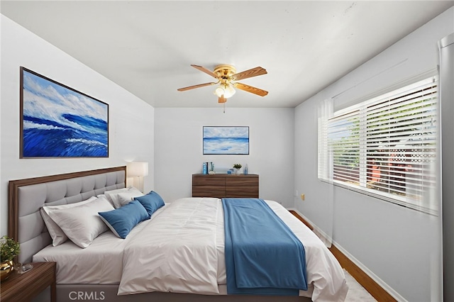 25925 Roanoke Rd, Menifee, CA 92586 - bedroom with wood finished floors and ceiling fan