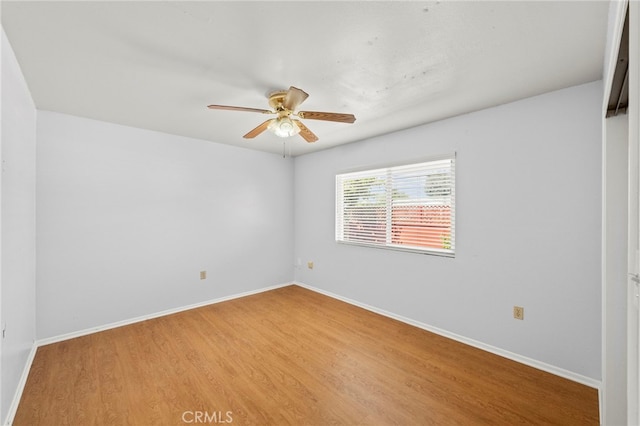 25925 Roanoke Rd, Menifee, CA 92586 - spare room with light wood finished floors and a ceiling fan