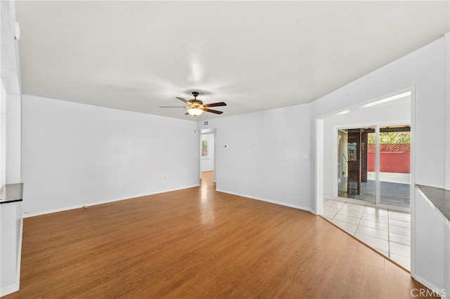 25925 Roanoke Rd, Menifee, CA 92586 - spare room featuring ceiling fan and light wood-type flooring