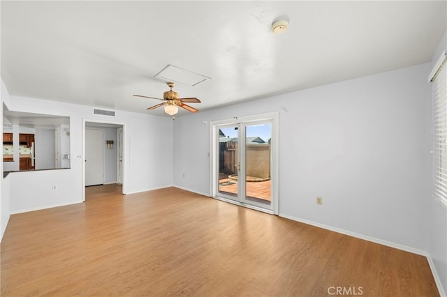 25925 Roanoke Rd, Menifee, CA 92586 - unfurnished room featuring attic access, a smoke detector, wood finished floors, and ceiling fan