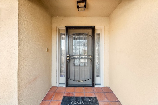 25925 Roanoke Rd, Menifee, CA 92586 - property entrance with stucco siding