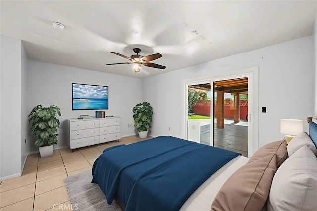 25925 Roanoke Rd, Menifee, CA 92586 - bedroom with access to exterior, light tile patterned floors, and a ceiling fan