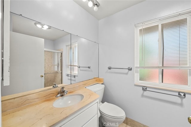 25925 Roanoke Rd, Menifee, CA 92586 - bathroom featuring vanity, a shower stall, plenty of natural light, and tile patterned flooring