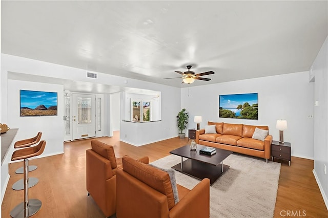 25925 Roanoke Rd, Menifee, CA 92586 - living room featuring wood finished floors and a ceiling fan