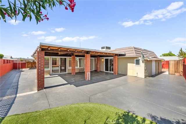 25925 Roanoke Rd, Menifee, CA 92586 - rear view of house featuring a patio and stucco siding