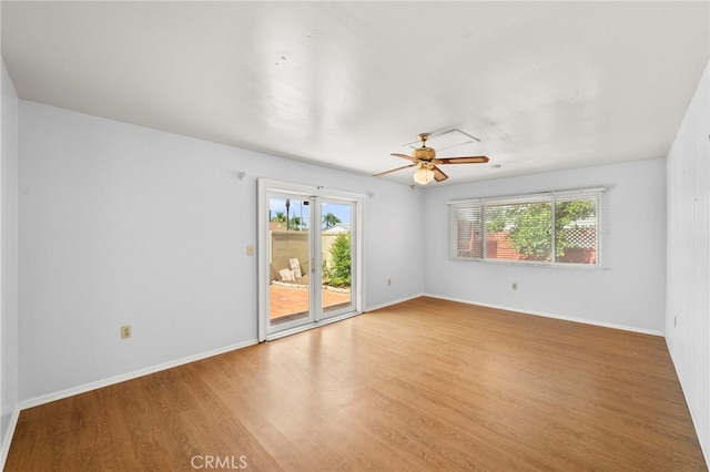 25925 Roanoke Rd, Menifee, CA 92586 - spare room with light wood finished floors and ceiling fan