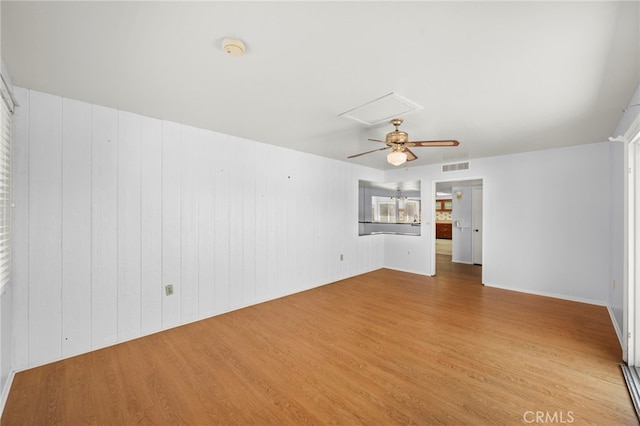 25925 Roanoke Rd, Menifee, CA 92586 - unfurnished room featuring light wood-style flooring, a smoke detector, a ceiling fan, and attic access