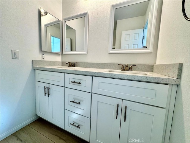 13105 Via Tuscany, Riverside, CA 92503 - bathroom featuring double vanity and wood finished floors