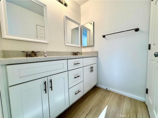13105 Via Tuscany, Riverside, CA 92503 - bathroom with wood finished floors and double vanity