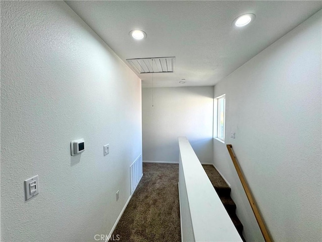 13105 Via Tuscany, Riverside, CA 92503 - hallway featuring attic access, dark colored carpet, an upstairs landing, and recessed lighting