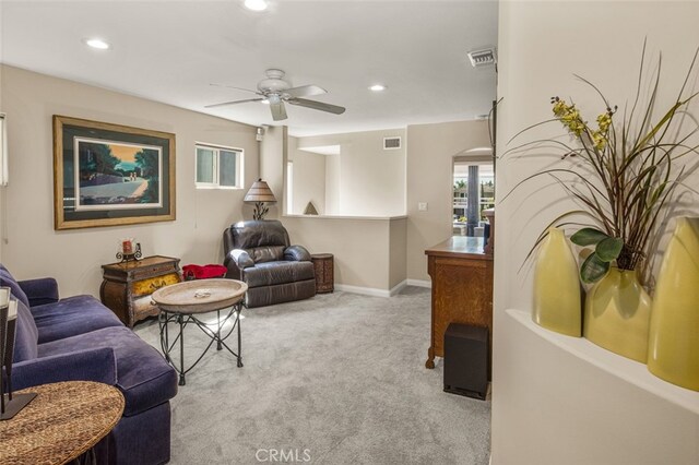 21891 Winnebago Ln, Lake Forest, CA 92630 - living room with carpet floors, a ceiling fan, recessed lighting, and arched walkways