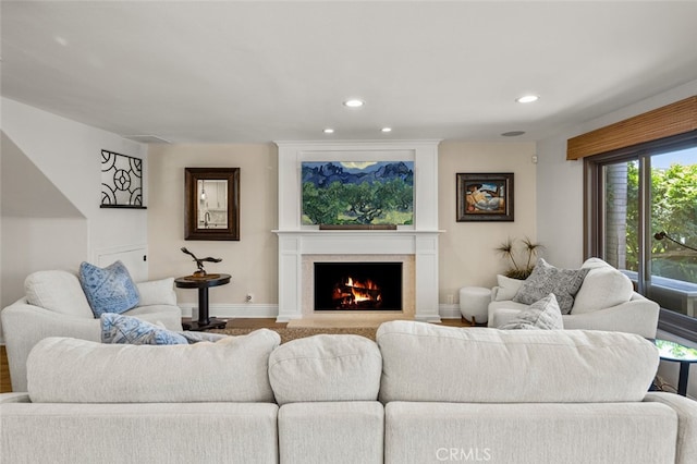 21891 Winnebago Ln, Lake Forest, CA 92630 - living area featuring a lit fireplace, recessed lighting, and wood finished floors