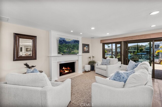 21891 Winnebago Ln, Lake Forest, CA 92630 - living room with recessed lighting and a fireplace with flush hearth