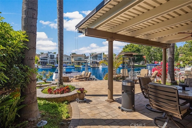 21891 Winnebago Ln, Lake Forest, CA 92630 - view of patio with a boat dock and a water view