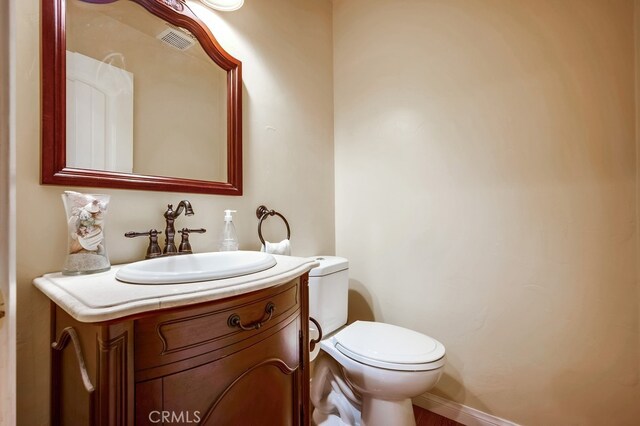 163 Wylerhorn Dr, Crestline, CA 92325 - half bathroom featuring toilet and vanity
