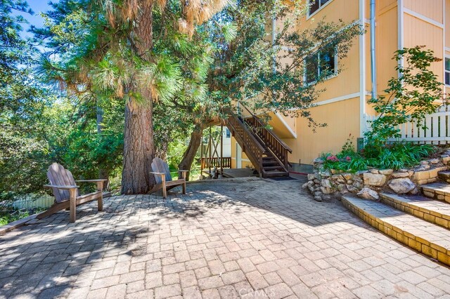 163 Wylerhorn Dr, Crestline, CA 92325 - view of patio / terrace with stairs