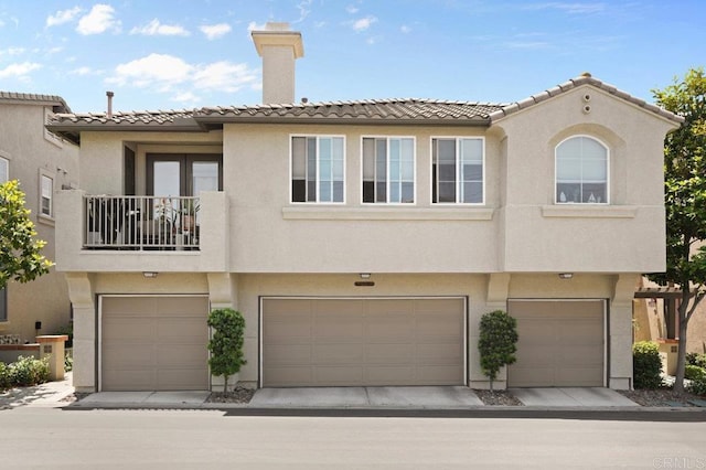 2128 Cantata # 38, Chula Vista, CA 91914 - townhome / multi-family property featuring stucco siding, a garage, and a tiled roof