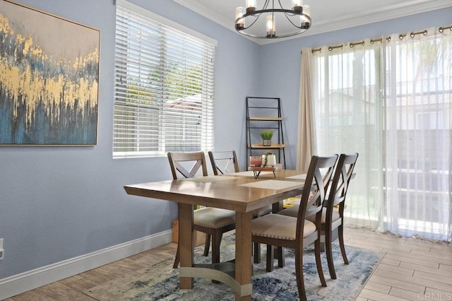 2128 Cantata # 38, Chula Vista, CA 91914 - dining room featuring a chandelier, ornamental molding, light wood-type flooring, and plenty of natural light