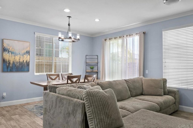 2128 Cantata # 38, Chula Vista, CA 91914 - living area featuring light wood finished floors, a chandelier, ornamental molding, and recessed lighting