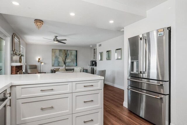 13655 Quinton Rd, San Diego, CA 92129 - kitchen featuring stainless steel fridge, a ceiling fan, open floor plan, dark wood-style floors, and light countertops