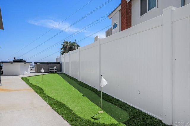 13655 Quinton Rd, San Diego, CA 92129 - view of yard with an area to practice putting and a hot tub