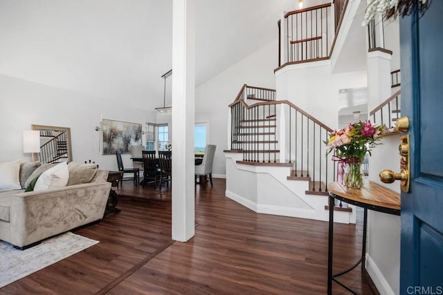 13655 Quinton Rd, San Diego, CA 92129 - entryway featuring stairs, high vaulted ceiling, and wood finished floors