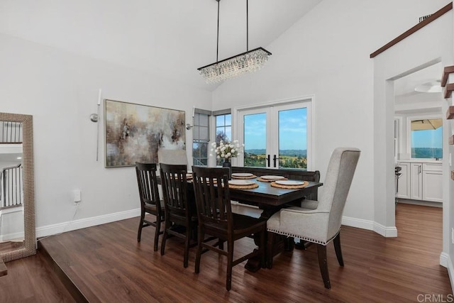 13655 Quinton Rd, San Diego, CA 92129 - dining room with wood finished floors, a chandelier, and high vaulted ceiling
