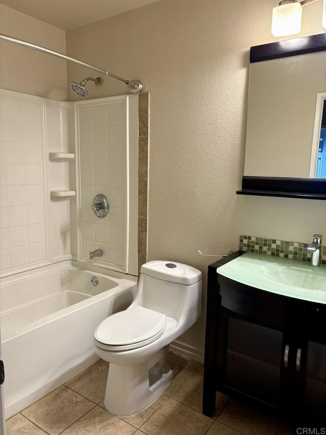 989 Ashton Ct, Vista, CA 92081 - bathroom featuring tub / shower combination, vanity, tile patterned floors, backsplash, and a textured wall
