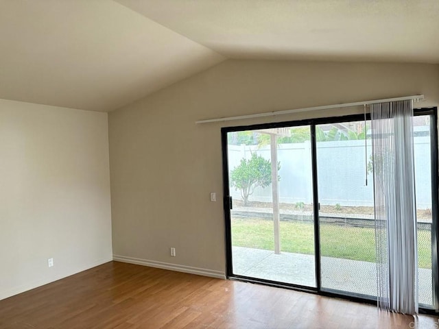 989 Ashton Ct, Vista, CA 92081 - spare room with lofted ceiling and wood finished floors