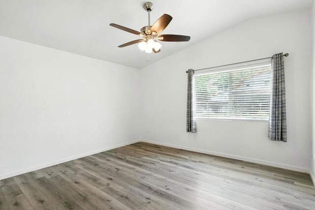 2760 Fieldbrook Way, Escondido, CA 92027 - spare room with vaulted ceiling, ceiling fan, and wood finished floors