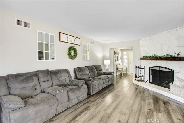1964 Baseline Rd, La Verne, CA 91750 - living room featuring wood finished floors and a large fireplace