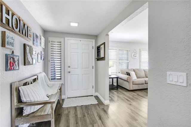 1964 Baseline Rd, La Verne, CA 91750 - foyer entrance with wood finished floors and a textured wall