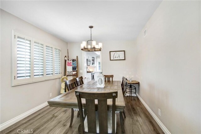 1964 Baseline Rd, La Verne, CA 91750 - dining space with a chandelier and wood finished floors