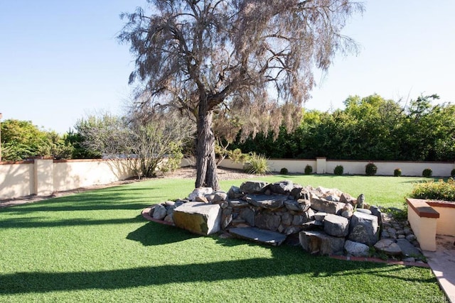 11705 Via Medanos, San Diego, CA 92128 - fenced backyard featuring a fire pit