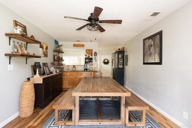 11705 Via Medanos, San Diego, CA 92128 - kitchen featuring open shelves, light wood finished floors, and a ceiling fan