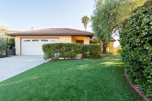11705 Via Medanos, San Diego, CA 92128 - view of front facade featuring driveway, an attached garage, stucco siding, and a front yard