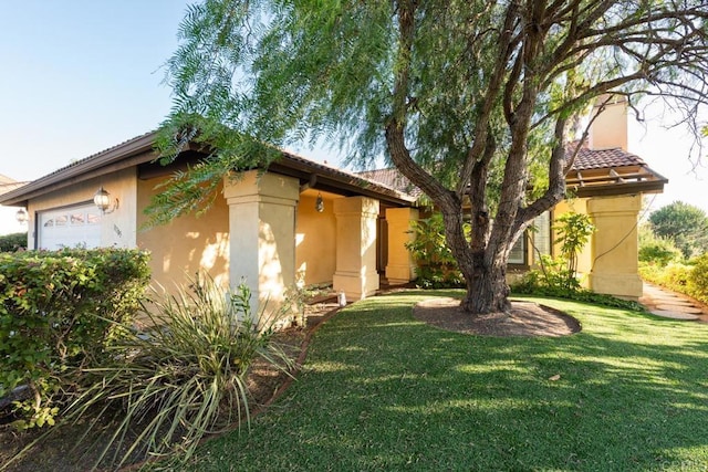 11705 Via Medanos, San Diego, CA 92128 - view of front of property with stucco siding, a front yard, and a garage