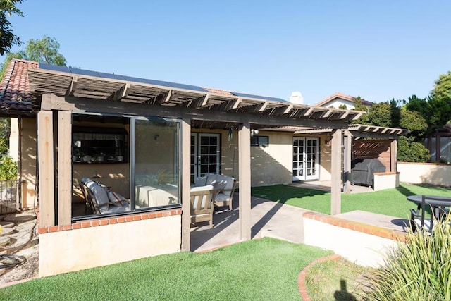 11705 Via Medanos, San Diego, CA 92128 - rear view of property featuring a pergola, stucco siding, a tile roof, a lawn, and a patio area