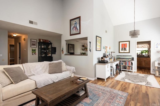 11705 Via Medanos, San Diego, CA 92128 - living area featuring high vaulted ceiling and wood finished floors
