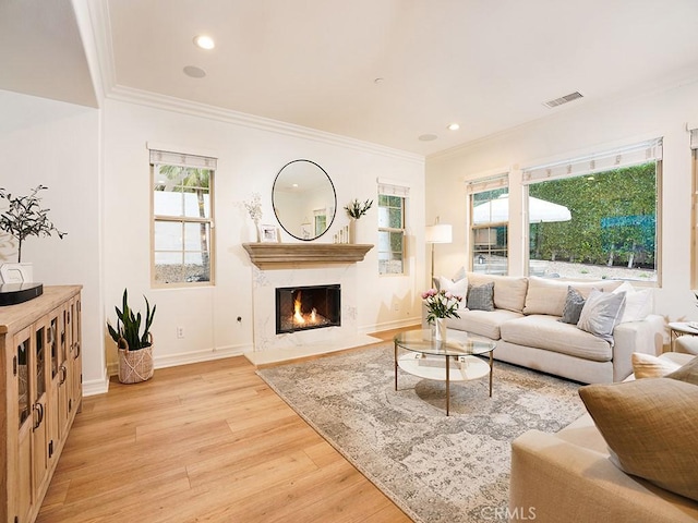 29 Via Timon, San Clemente, CA 92673 - living room featuring wood finished floors, healthy amount of natural light, crown molding, a fireplace, and recessed lighting