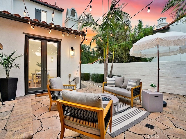 29 Via Timon, San Clemente, CA 92673 - patio terrace at dusk with french doors, a patio, and an outdoor hangout area