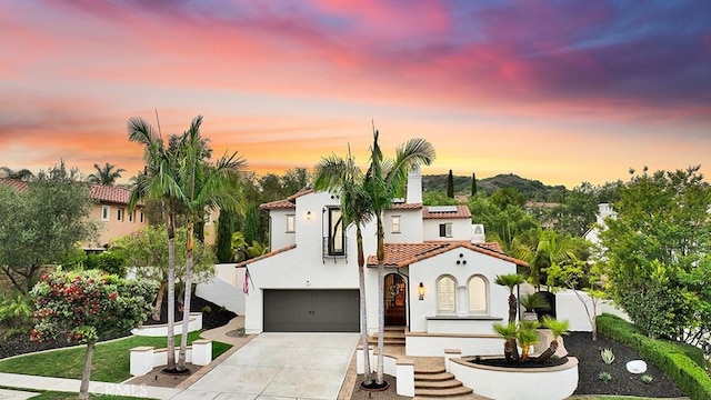 29 Via Timon, San Clemente, CA 92673 - mediterranean / spanish home with stucco siding, a tile roof, an attached garage, solar panels, and driveway