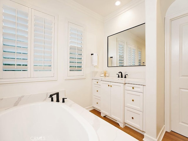 29 Via Timon, San Clemente, CA 92673 - bathroom with ornamental molding, vanity, wood finished floors, a tub to relax in, and recessed lighting