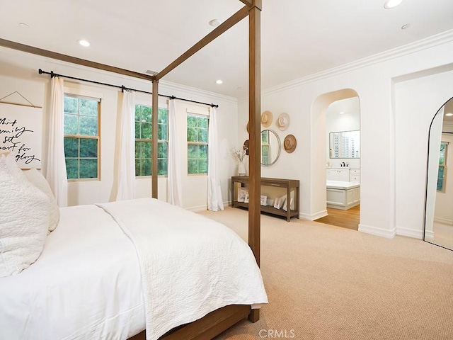 29 Via Timon, San Clemente, CA 92673 - bedroom with light carpet, crown molding, arched walkways, recessed lighting, and ensuite bath