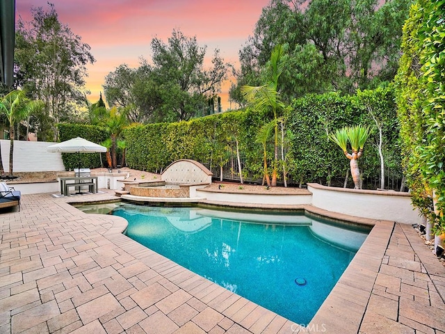 29 Via Timon, San Clemente, CA 92673 - pool at dusk featuring a patio and a fenced backyard