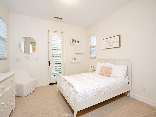 29 Via Timon, San Clemente, CA 92673 - carpeted bedroom featuring multiple windows and access to exterior