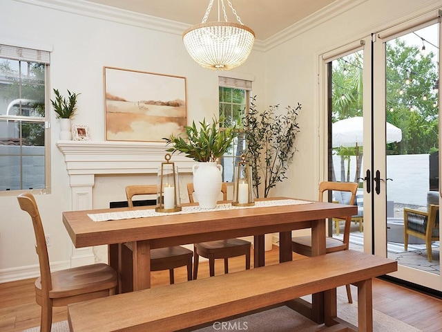 29 Via Timon, San Clemente, CA 92673 - dining area with light wood-type flooring, plenty of natural light, crown molding, and a chandelier