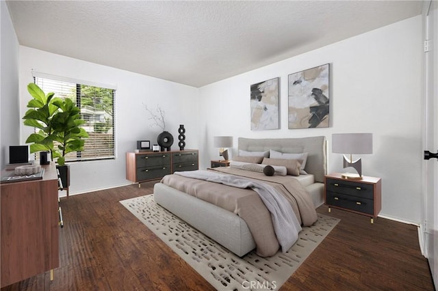 25644 Mont Pointe Unit 1A, Lake Forest, CA 92630 - bedroom featuring wood finished floors and a textured ceiling